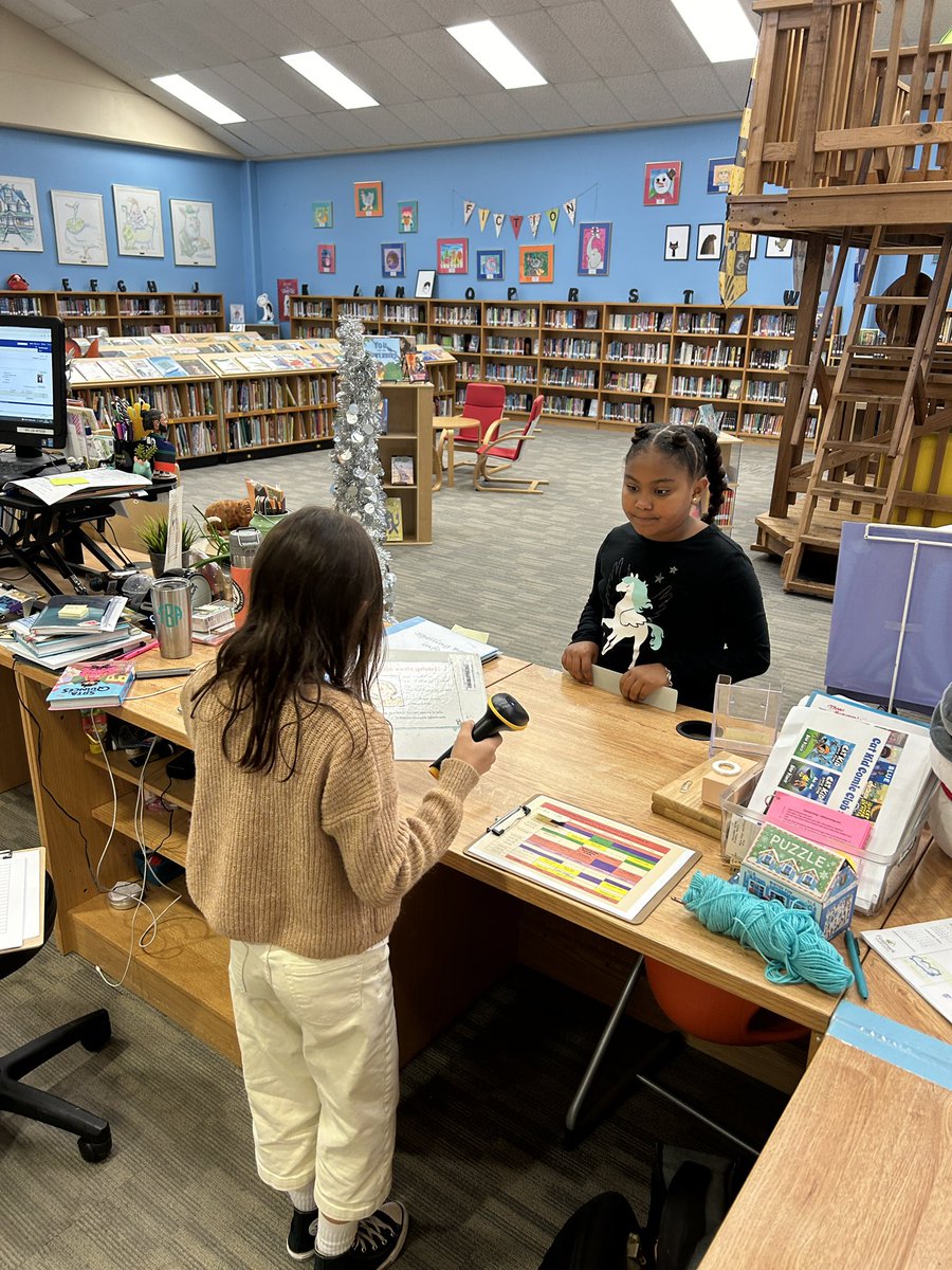 Meet our Librarian for a Day, Kaya! She checked out books, did read alouds, processed new books, helped administer a spelling bee in the library, and showed students how to upcycle new books I to fun projects! There is nothing she can’t do! Kaya, you are hired! 📚 <a href="/WoodridgeElem/">Woodridge</a>