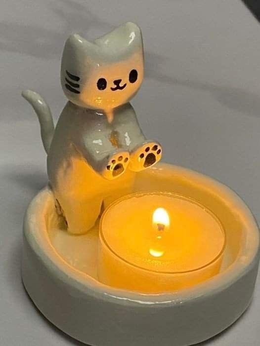 gatitosentiment's tweet photo. Gatito Sentimental inspired candle holders but they keep getting more silly https://t.co/cmlFD53G2W