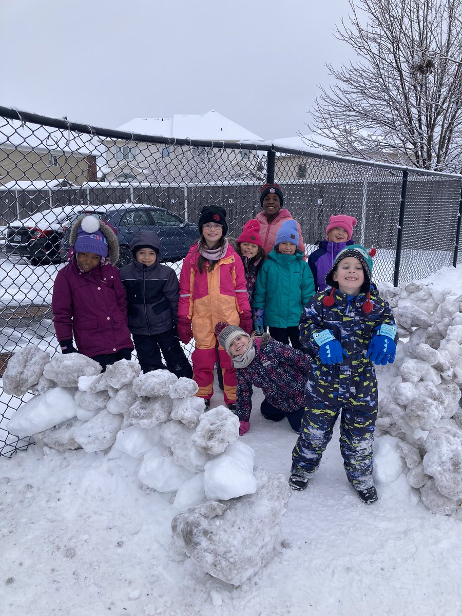 The students are so happy the snow has arrived: it’s fort-building time!