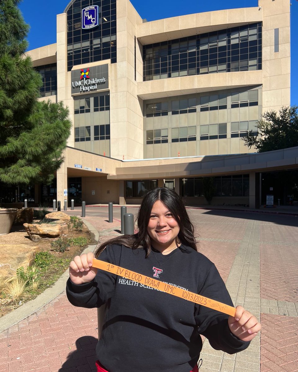 TTUHSC's tweet photo. “who’s next? 💉” Posing for a photo with the tourniquet from their #FirstIV start is a tradition for nursing students like Briana, and others in the @ttuhscson School of Nursing in Lubbock. #RedRaiderNurse https://t.co/EiPKJ82szO