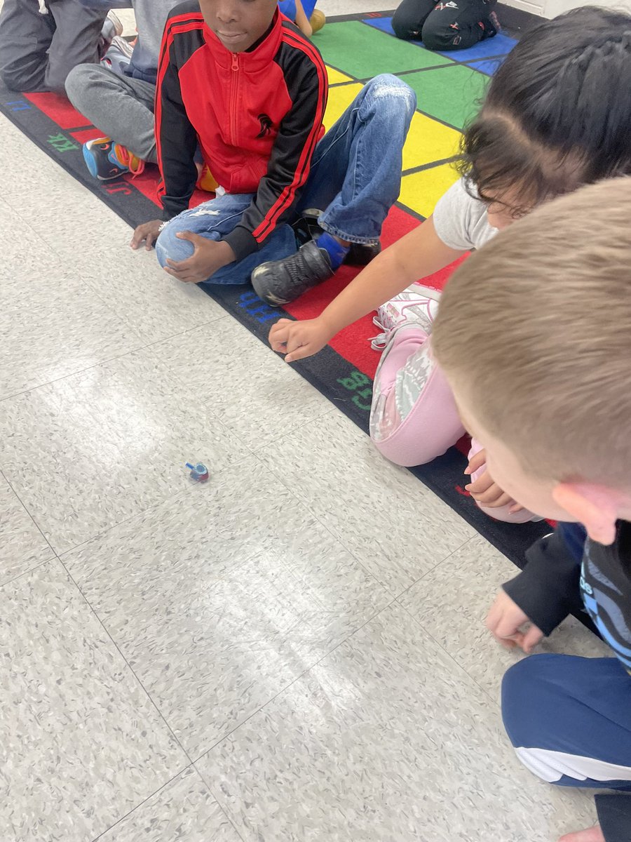 Today we learned about Hanukkah and practiced spinning a dreidel! <a href="/TPaineIES/">Thomas Paine Elementary</a>
