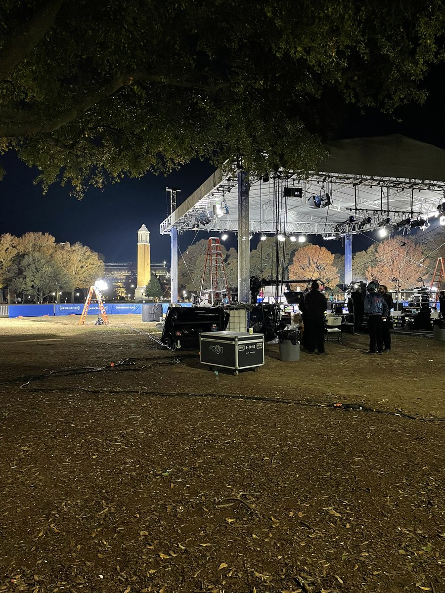 AmericainView's tweet photo. NewsNation Decision Desk staged on University of Alabama campus with Quad in the background, including Denny Chimes and behind that some football stadium. https://t.co/EGKi9cx90h