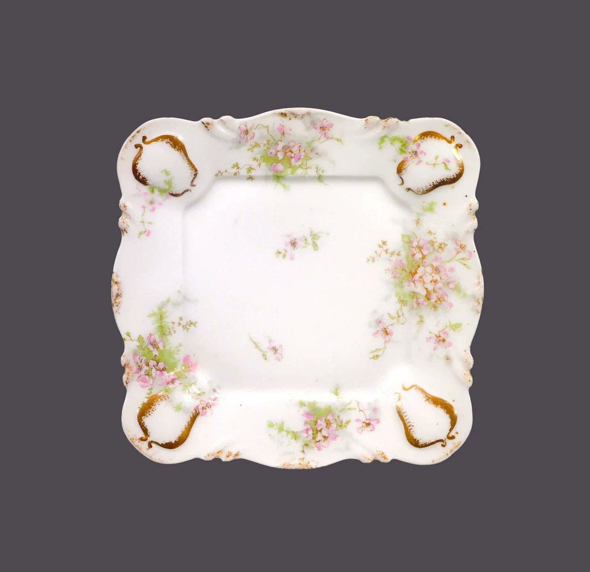 G97816960Girl's tweet photo. Antique Theodore Haviland Limoges Schleiger 67L square serving plate. Art-nouveau pink floral sprays embossed gold. https://t.co/kd4nfRcBxP via @Etsy #BuyfromGroovy #antiqueshop #tableware #antiquetableware #artnouveau #Limoges #antiqueLimoges #TheodoreHaviland #teaparty #teatime #EtsySellers