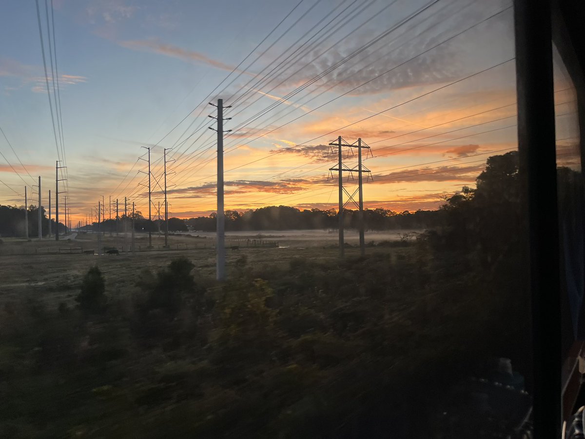 CLRadio's tweet photo. Sunrise over Florida as seen from the #autotrain https://t.co/w9x6P2ZNBL