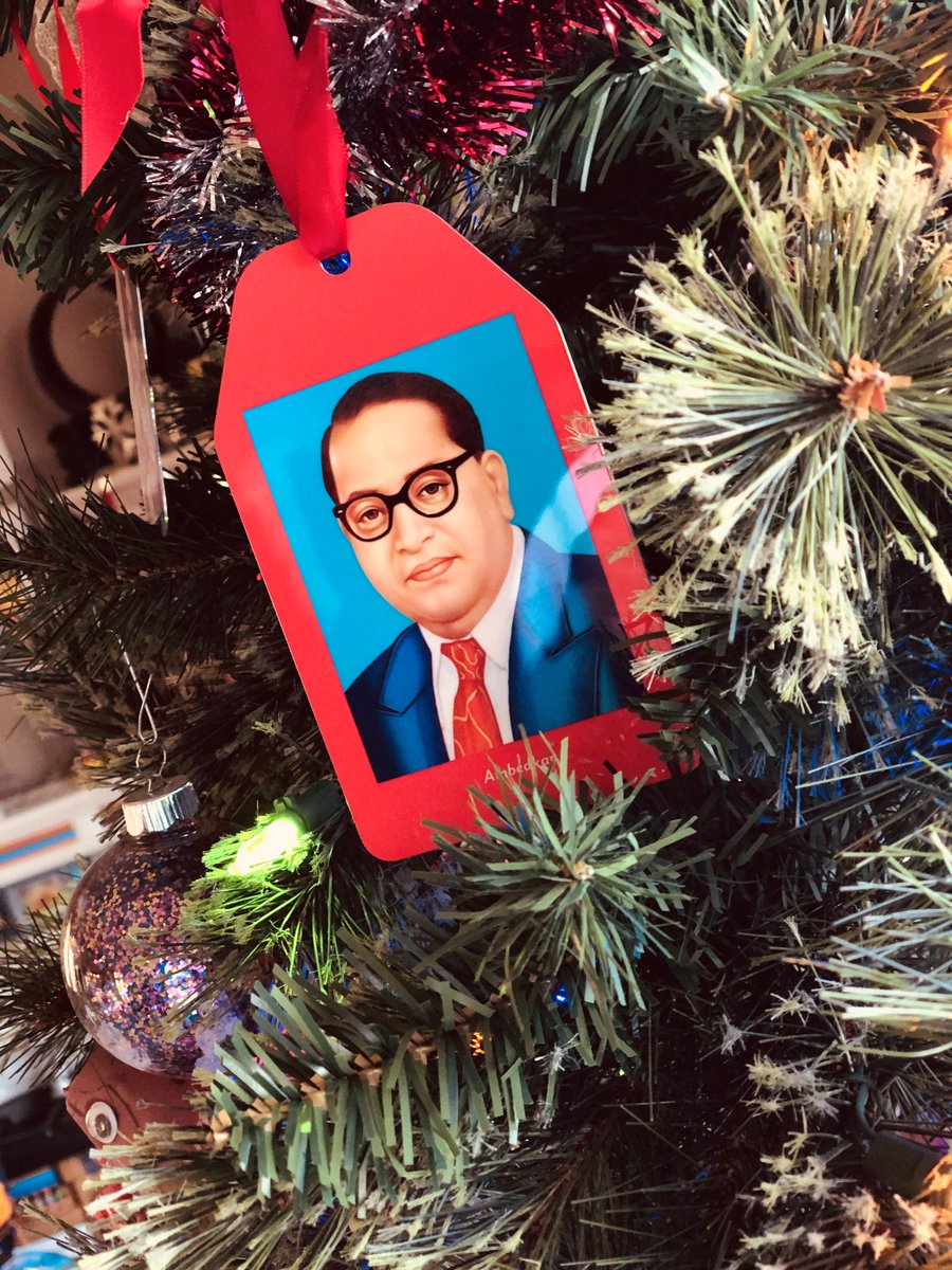 scottrstroud's tweet photo. Our Christmas tree is adorned with many ornaments signifying important life moments, memories, &amp; events. I always smile when Bhimrao #Ambedkar's Mahaparinirvan Diwas rolls around &amp; I see Babasaheb's image up high on our tree. #Jaibhim #MahaparinirvanDiwas https://t.co/01X7woPOW6