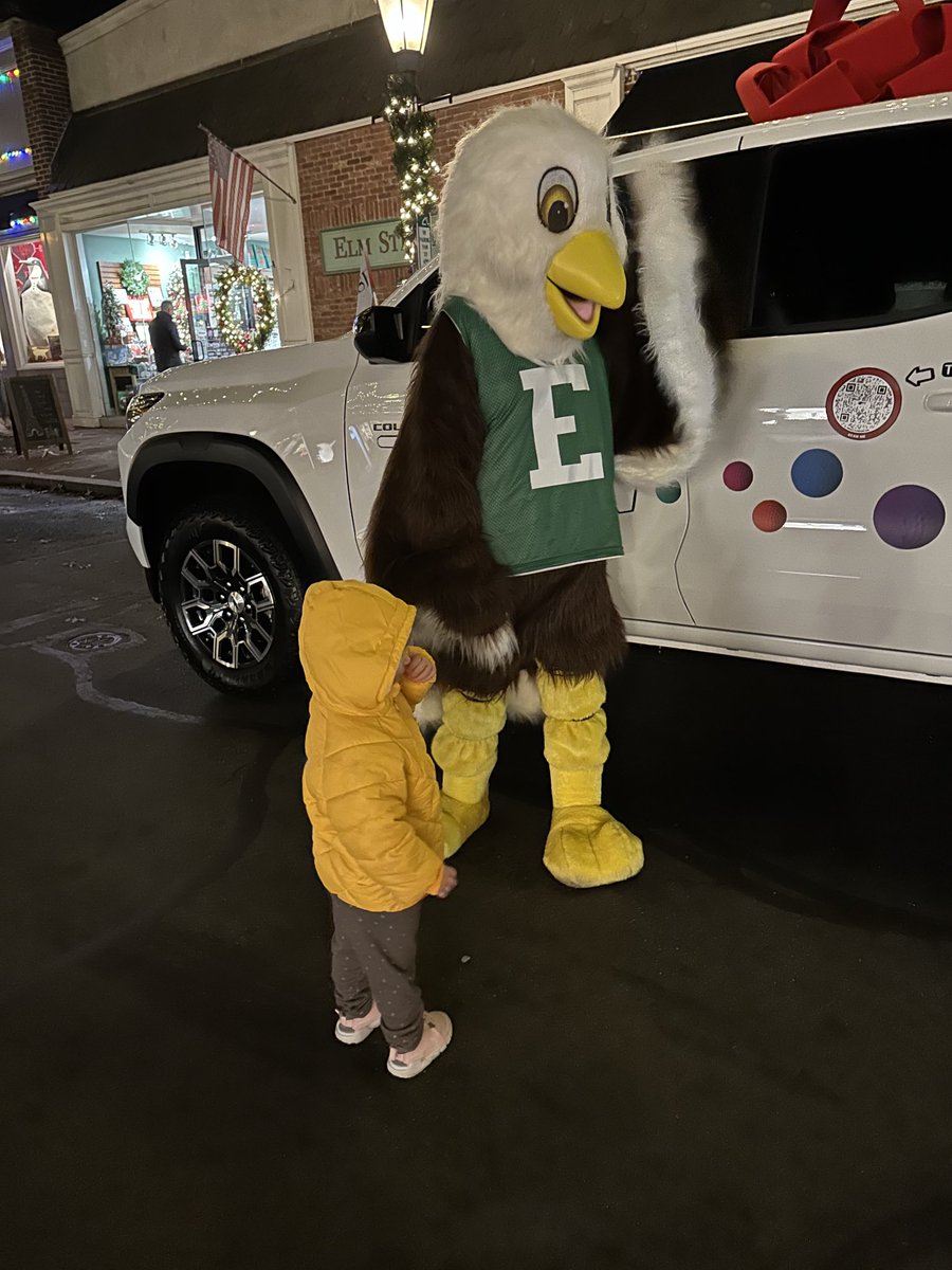NCSF11Farm's tweet photo. East Eagle made friends at the NC Holiday Stroll while flapping her wings with joy for the NC Color Drop.  Buy a ball and you may win a Chevy Colorado.  https://t.co/951PGgyVwE ⁦@NCHS_CT⁩ ⁦@EastSchoolNC⁩ https://t.co/mP0UFk1qsA