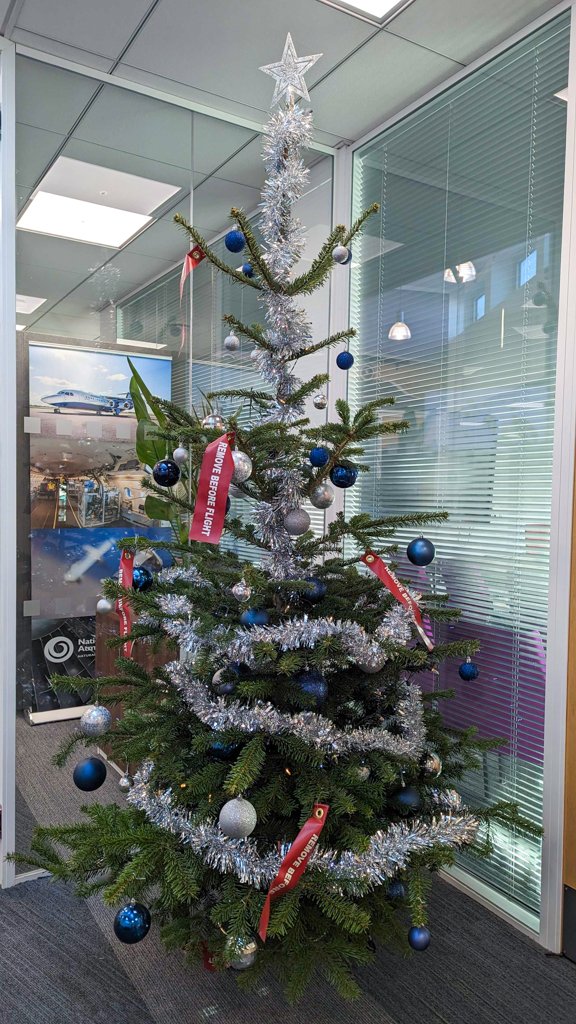 faam146's tweet photo. The team got creative with the office Christmas tree this year!🎄✈️ https://t.co/2GqpnBJX6M