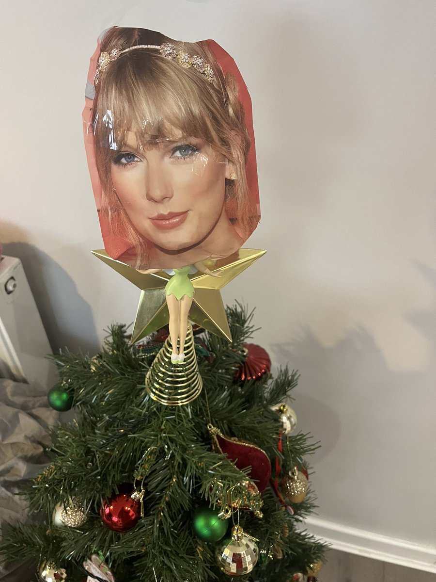 Secret Santa wrapped my gift in the Queen’s face so naturally I’ve added it to the top of our mini tree. 🤷🏼‍♀️

Both a star and an angel. How long will it take my boyfriend to notice? 🎄✨😇

I can still make the whole tree shimmer <a href="/taylorswift13/">Taylor Swift</a>  <a href="/taylornation13/">Taylor Nation</a>