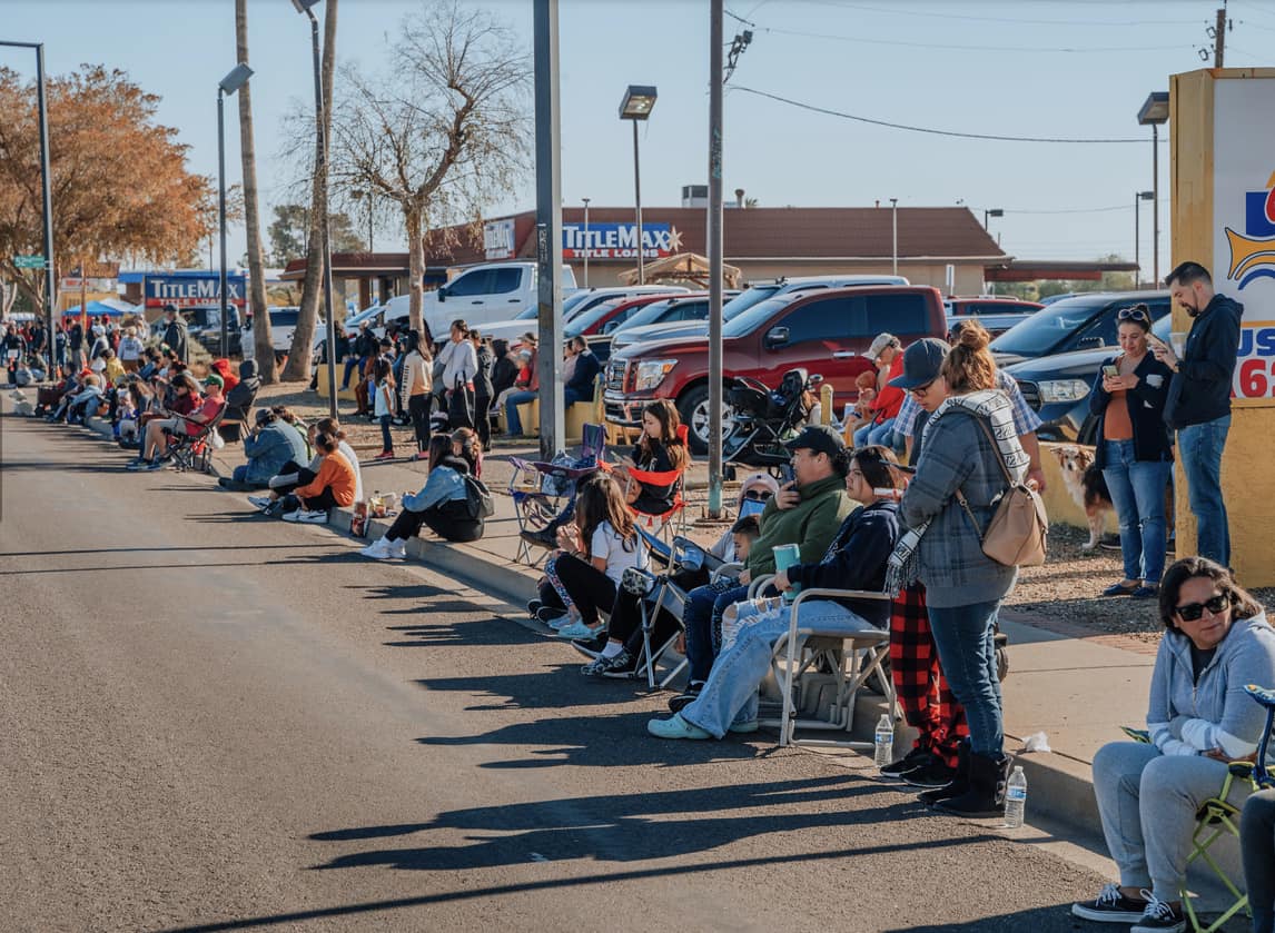 HCParadeAZ's tweet photo. What is your go-to essential item when you watch the parade? Maybe it’s a visit to a store or restaurant along the parade route? Maybe a special camp chair or blanket to sit on?  Tell us what you bring or do to make the Hometown Christmas Parade special for you and your family! https://t.co/cQVwnC7DGC