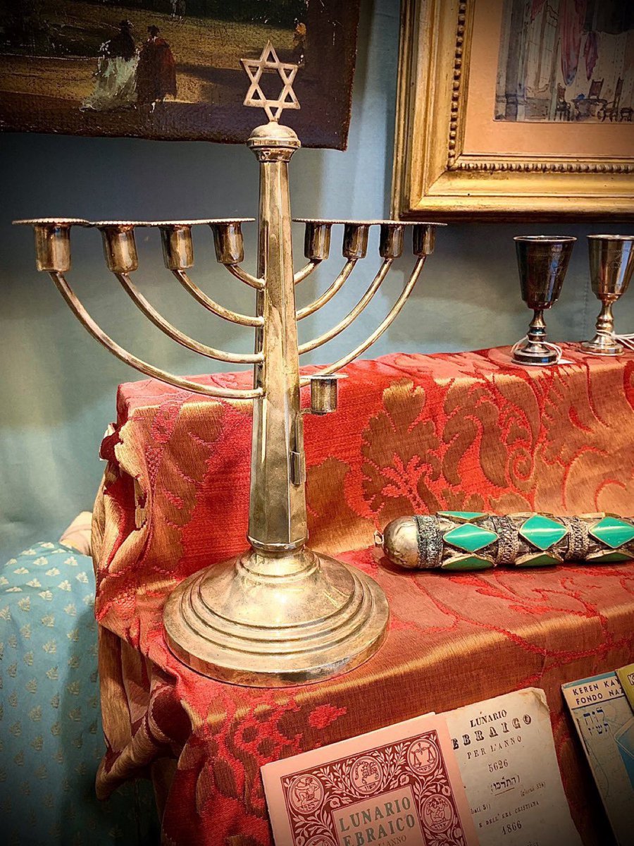 This sterling silver menorah from @antichitaghetto was created in 1959. We wonder how many times the candles have been lit for Chanukah and how many blessings have been sung... Tonight, on the first night of Chanukah we wish you peace & light. #Venice #Venezia #Chanukah