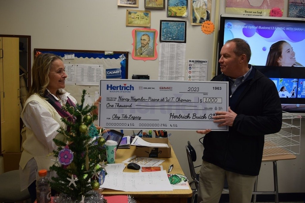 Congrats to WTC Art Teacher Ms. Nancy Neyerlin-Pisano who was awarded a $1k grant from Hertrichs Auto Group for her Legacy Tiles project. Nancy is pictures here receiving her award today from Mr. Allen of Hertrichs. Well done!