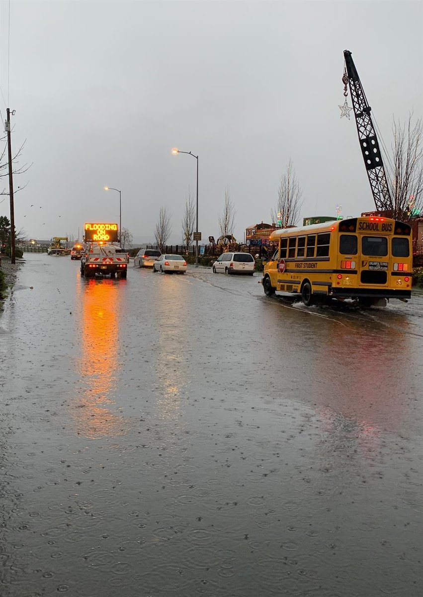 OregonDOT's tweet image. #SWOregon: Heavy rain and high tides are causing high water and flooding on US 101 in #CoosBay. Conditions can change quickly. Be prepared for delays and closures. Use caution and consider delaying your travel until waters recede. Use TripCheck.com to track conditions.