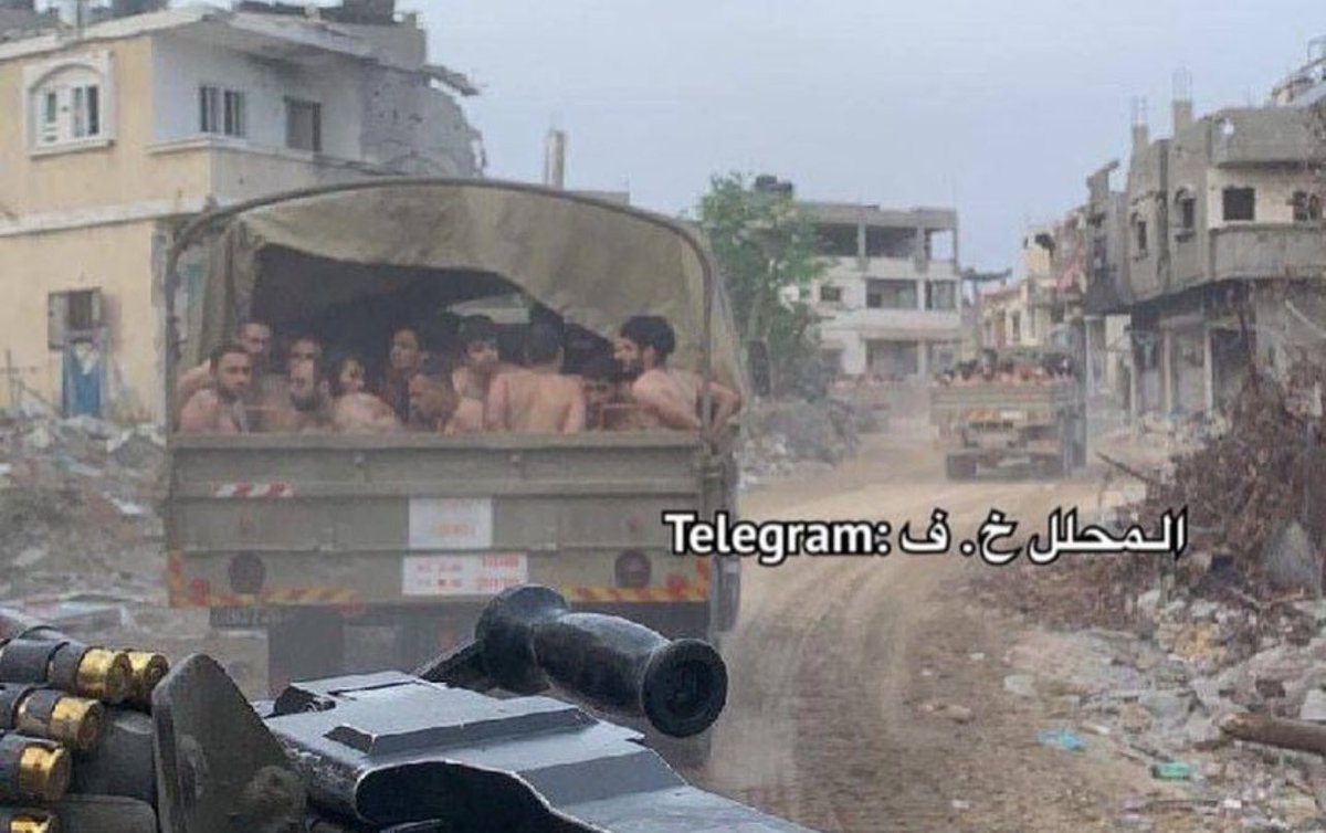 AlaHamdann's tweet photo. Palestinian civilians in #Gaza are not only hungry, thirsty, injured and homeless. They are also forced to take off their clothes, sit still in the cold weather and then kidnapped to the unknown by the Israeli army. These facts you will never see on bias channels or Morgan’s show. 

#Apartheid