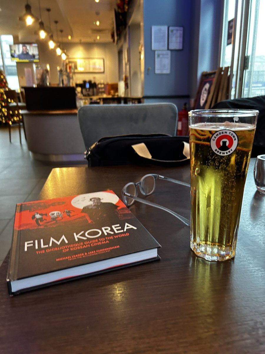 bazjames's tweet photo. @ghibliotheque No better way to spend an afternoon than hiding from the rain in a pub reading this fantastic book. Constantly having to stop to add films to my JustWatch watch list though. https://t.co/pF6tS0bIJt
