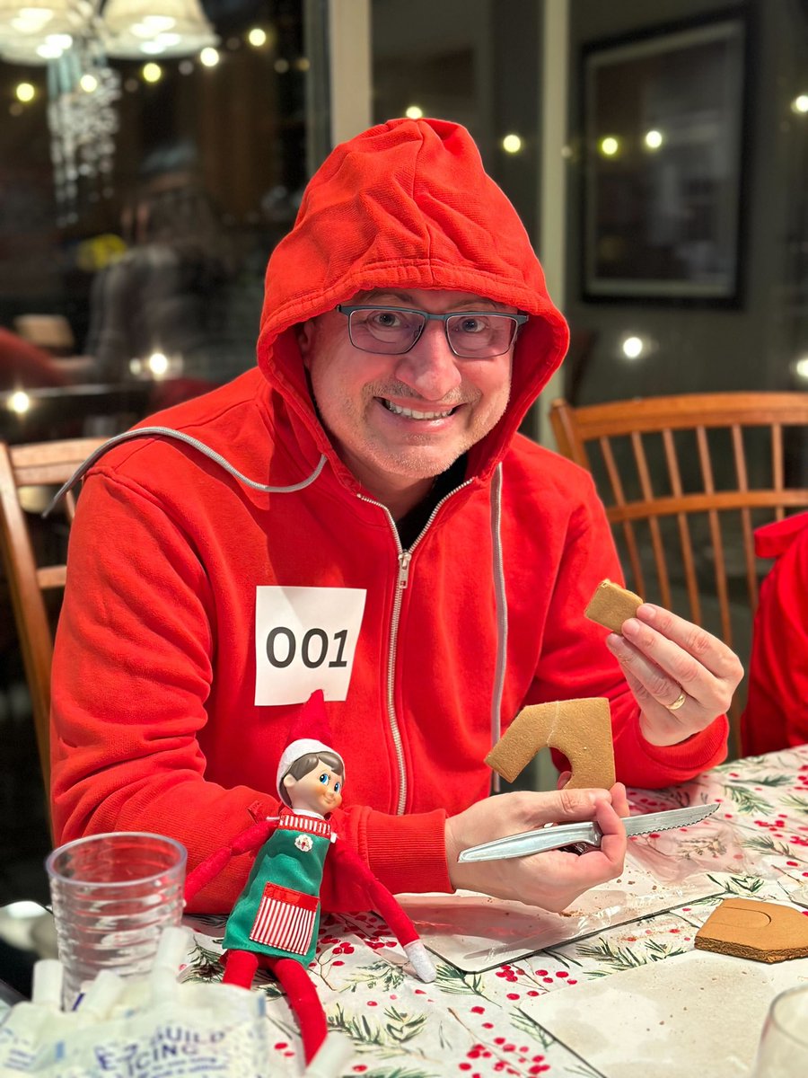 NLDAppraisals's tweet photo. Yesterday was a late night. NLDBuddy and his team Lexi Williams and Lisa Dingwall  are prepping a gingerbread house entry for the @reicnational BC Christmas gala contest next week! I think our President, Michael LaPorte is having his own Squid-Elf games moment!  #nldbuddy #reic https://t.co/Og9gMcxF96