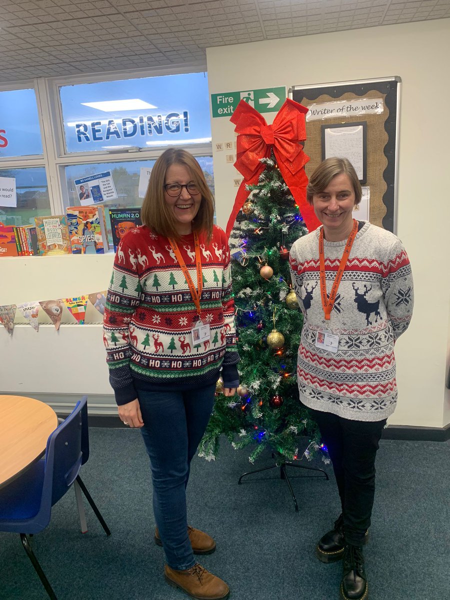 Well done to our Head of Teaching and Teaching Co-ordinator - who managed to locate their Christmas jumpers and remembered to wear them into the office! Pictured in <a href="/SchoolThameside/">Thameside Primary School</a>'s super festive reading corner! #ChristmasJumper #Festive