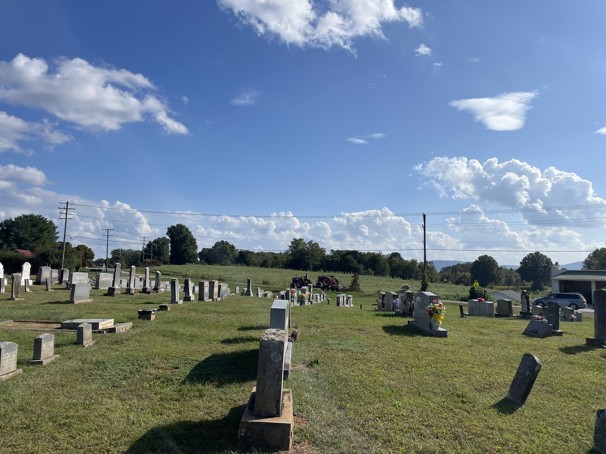 IdaColumite's tweet photo. Tractors on graves. Tractor towing…another tractor past the graveyard. #rural #NC #baccer https://t.co/wkqv2B98CZ