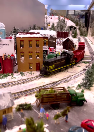 SFCCInitiative's tweet photo. All aboard! The holiday train has made its triumphant return to the @SFPublicLibrary Main Library’s Fisher Children’s Center on the 2nd Floor. Designed by CMRSTrainClub, they want to encourage a love of model railroading for future generations.🚂 https://t.co/xPh4VeTF7s