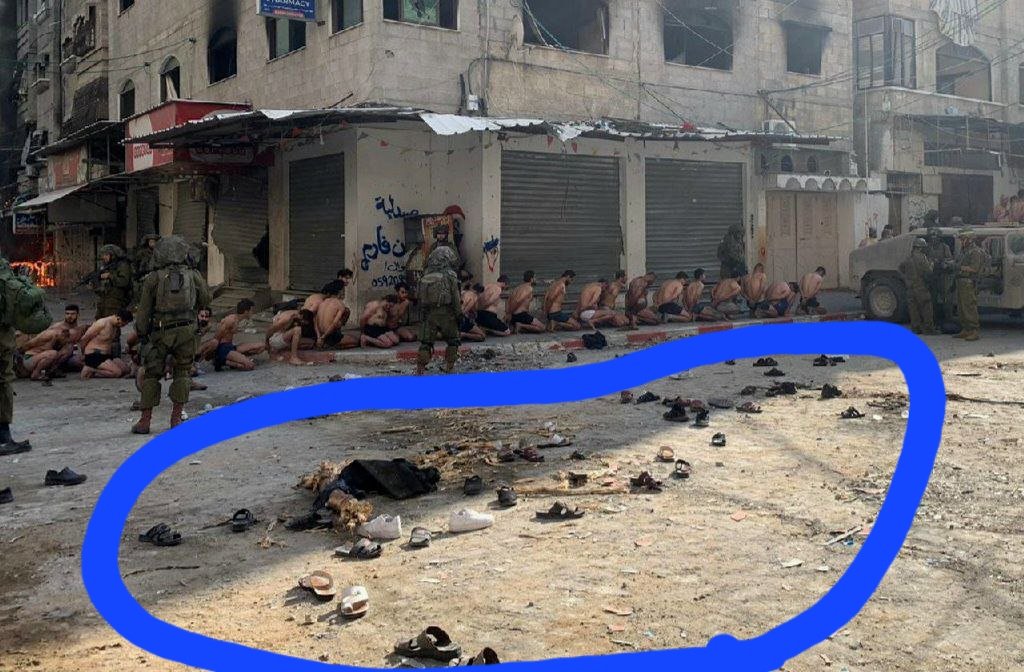 يستمرون بالكذب لكسب تعاطف العالم ولكن الله سبحانه يكشفهم فلك ان تتخيل انهم يدعون القاء القبض على 100 مقاتل من حماس في هذه الصورة و بالحقيقة فقد اعتقلو 100 مدني اعزل و من النظر لأحذية المعتقلين ستعرف ذالك، اللهم ارنا بالصهاينة عجائب قدرتك اللهم خذهم اخذ عزيز مقتدر
