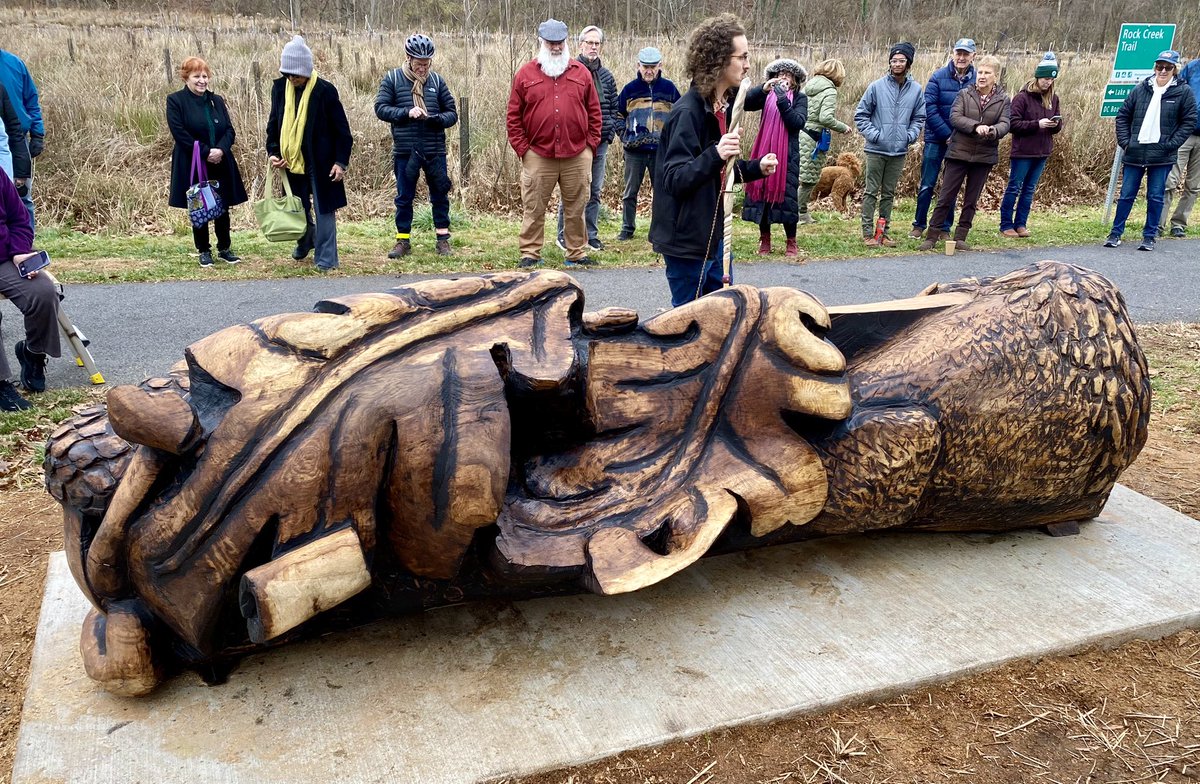 Today, <a href="/MontgomeryParks/">Montgomery Parks</a> unveiled a tribute to the 300 year old Linden Oak, a former champion tree in one of our parks. Chainsaw artist “Carving Collin” transformed a huge branch of the tree into a beautiful bench adorned with an eastern buffalo, acorn, and oak leaves.