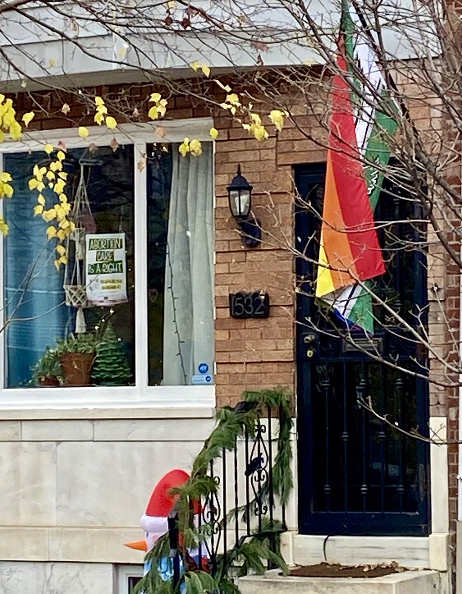 Eagles flag on one side, rainbow flag on the other, pro-abortion sign in the window, & Christmas decorations too. This is why I love my city. #PhillyProud