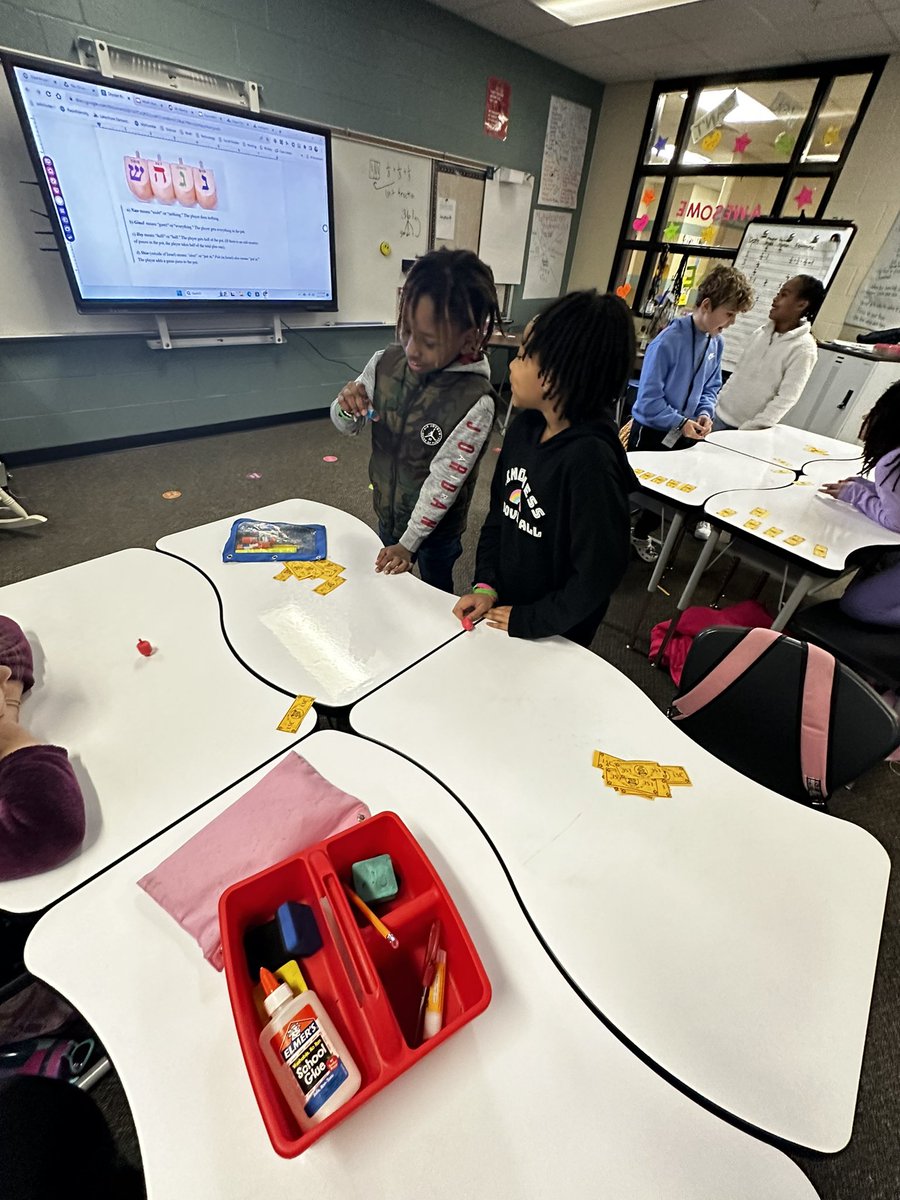 MsKSantangelo's tweet photo. Happy Hanukkah (tonight) We spent some time learning how to play dreidel!  #santangelosquad #wearelakeshore #culturalawareness  #workingtogether https://t.co/zwUYQM8mIj