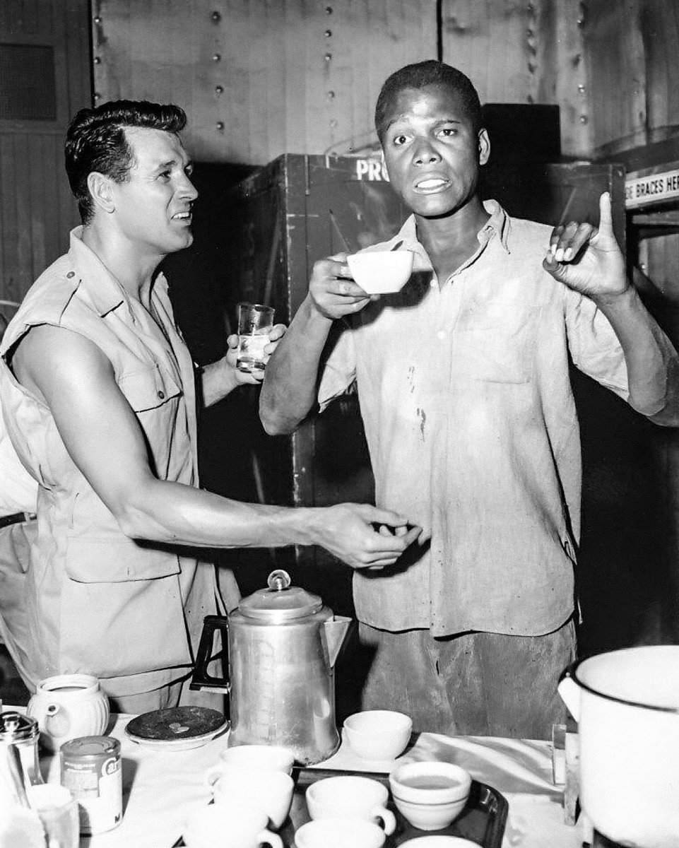 Rock Hudson and Sidney Poitier on the set of Something of Value (1957)