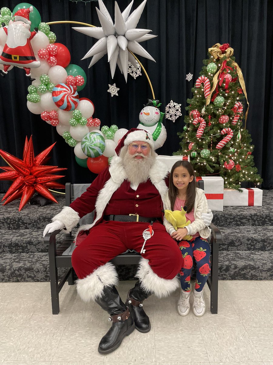 MrsCasana's tweet photo. In other news, SANTA CAME TO @JanieStarkES !!! After reading to my students in the classroom for literacy night, I got to wear my mama hat and snap a pic of my girl with Santa.  So thankful for these super sweet experiences not only for my kids, but for my daughters. #starkishome https://t.co/fAaWnvZoYp