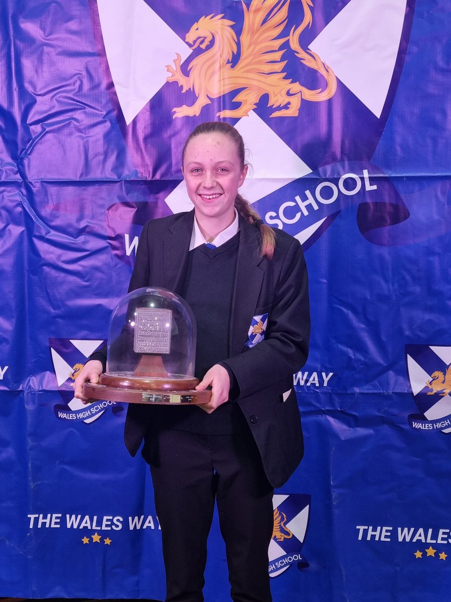 whs_schlibrary's tweet photo. Super proud of Evie, one of our student librarians, as she picks up the Alice Booth Library Award at Presentation Evening! 📚💕🎊 @WalesHigh https://t.co/wayYoPQgMe