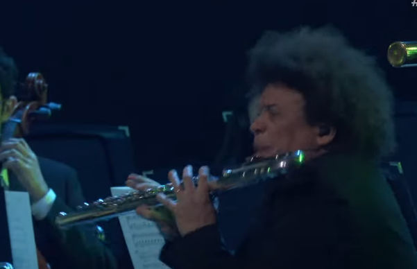 SongbirdN7's tweet photo. Flute Guy (Pedro Eustache) as the final boss of a video game. He has 3 phases and his contrabass flute does massive AOE damage #TheGameAwards https://t.co/nFGLLyOjsh