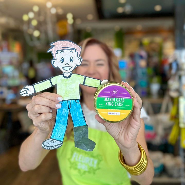 It's official—Flat Stanley might be the tiniest customer we've ever had walk through our doors. 🤣 Shoutout to the 2nd graders at Saint Philip Neri! We had a blast shopping around with your friend. Y'all come in and shop his faves with us! 🙌💚 #fleurtygirl