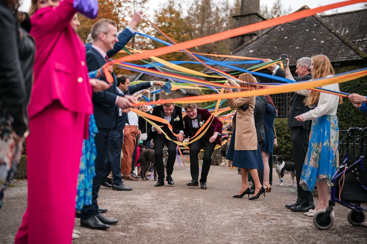 Why have confetti when you can have ribbons ?! (think they'd have probably hoped for them held higher though!) 
David &amp; Lyndon enjoying a more unique exit to their wedding at Broadoaks Country House. ❤️