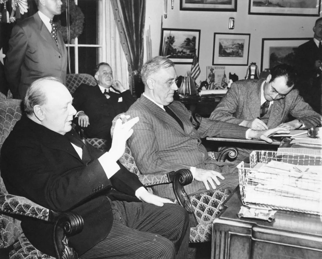 Two weeks after Pearl Harbor, Churchill and FDR meet reporters in Oval Office, today 1941: