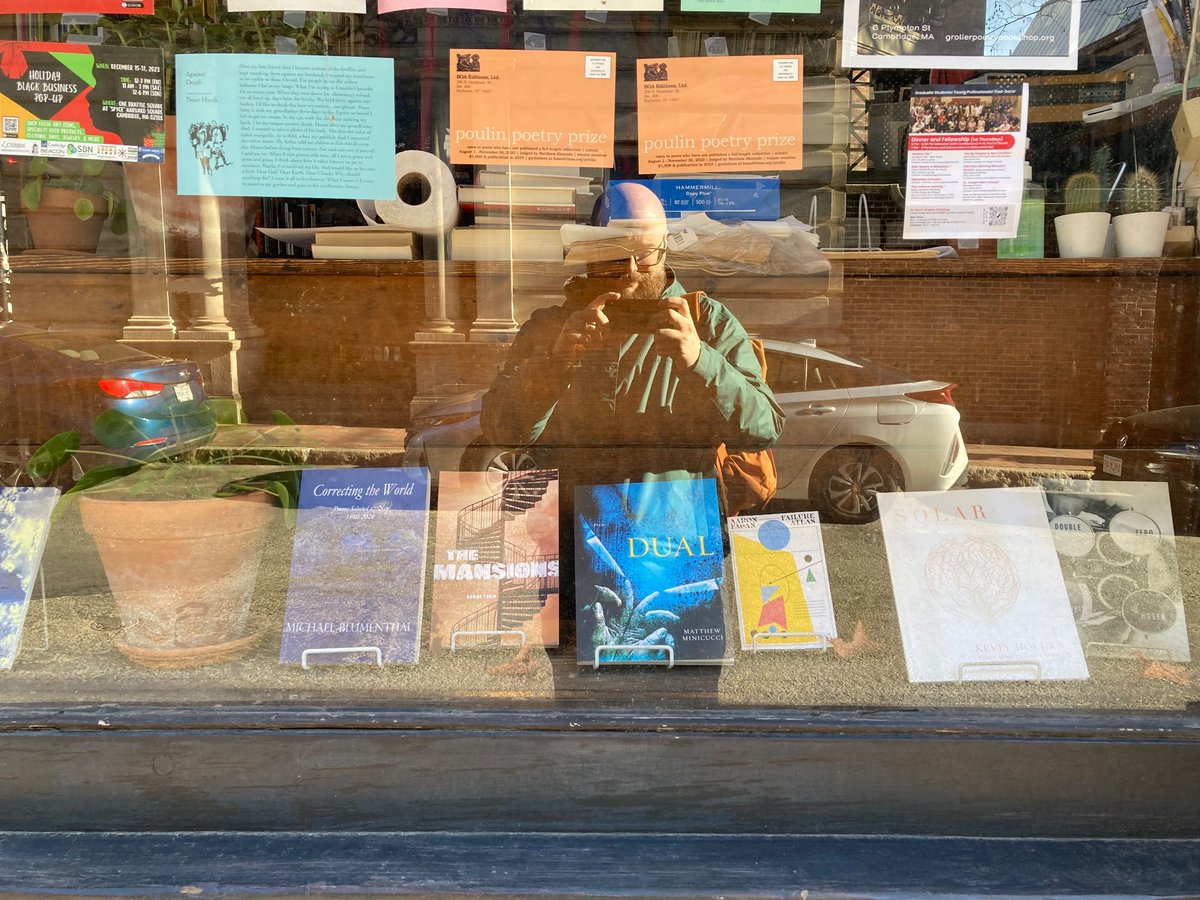Poetry dream realized today after @Grolier_Poetry put a copy of DUAL in their display window. A tear may have been shed 🥺