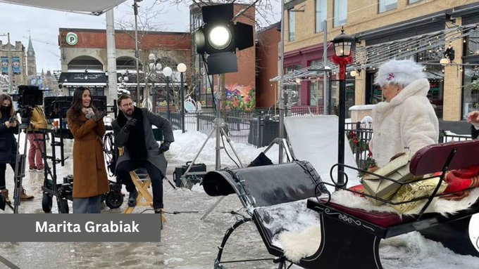 A film set in the ByWard Market featuring a crew, lights a camera and a large sleigh. On the set of Laughing all the Way, filmed here in January. Photo: Marita Grabiak 