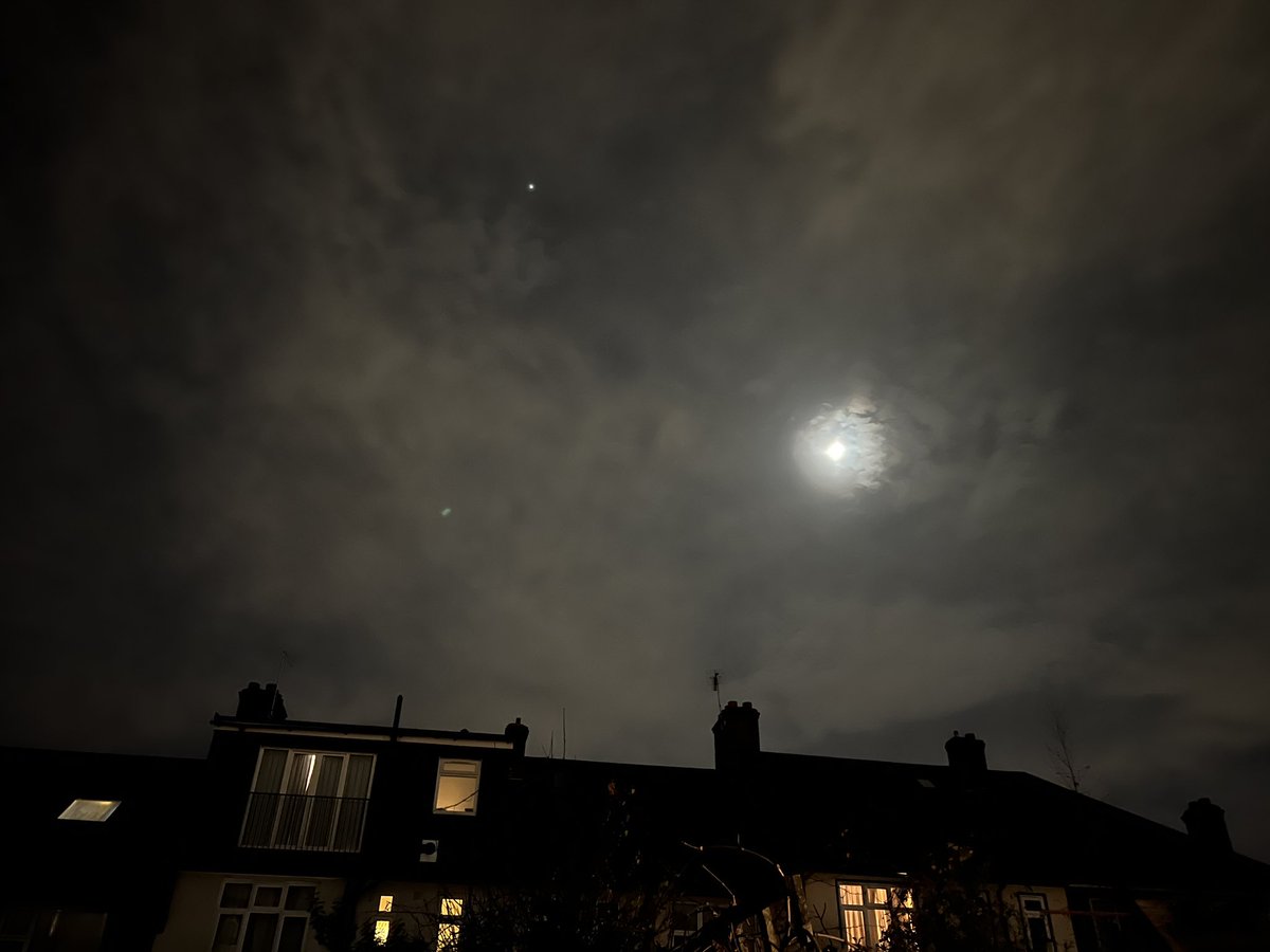 Solstice Eve: cold and swirling clouds. Moon and Jupiter.