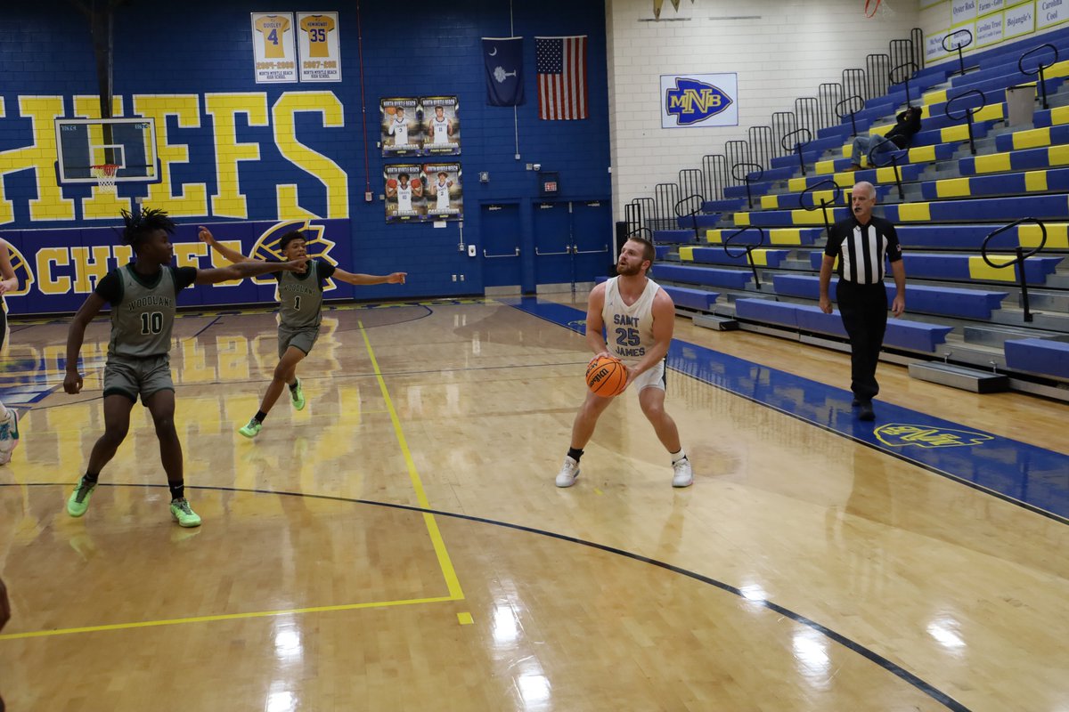 Connor Schwalm drills a clutch three for St. James late in Q4 to help pick up the first win of the weekend for the Sharks.

St. James opens up Shootout by the Sea with a 55-49 win oer Woodland.