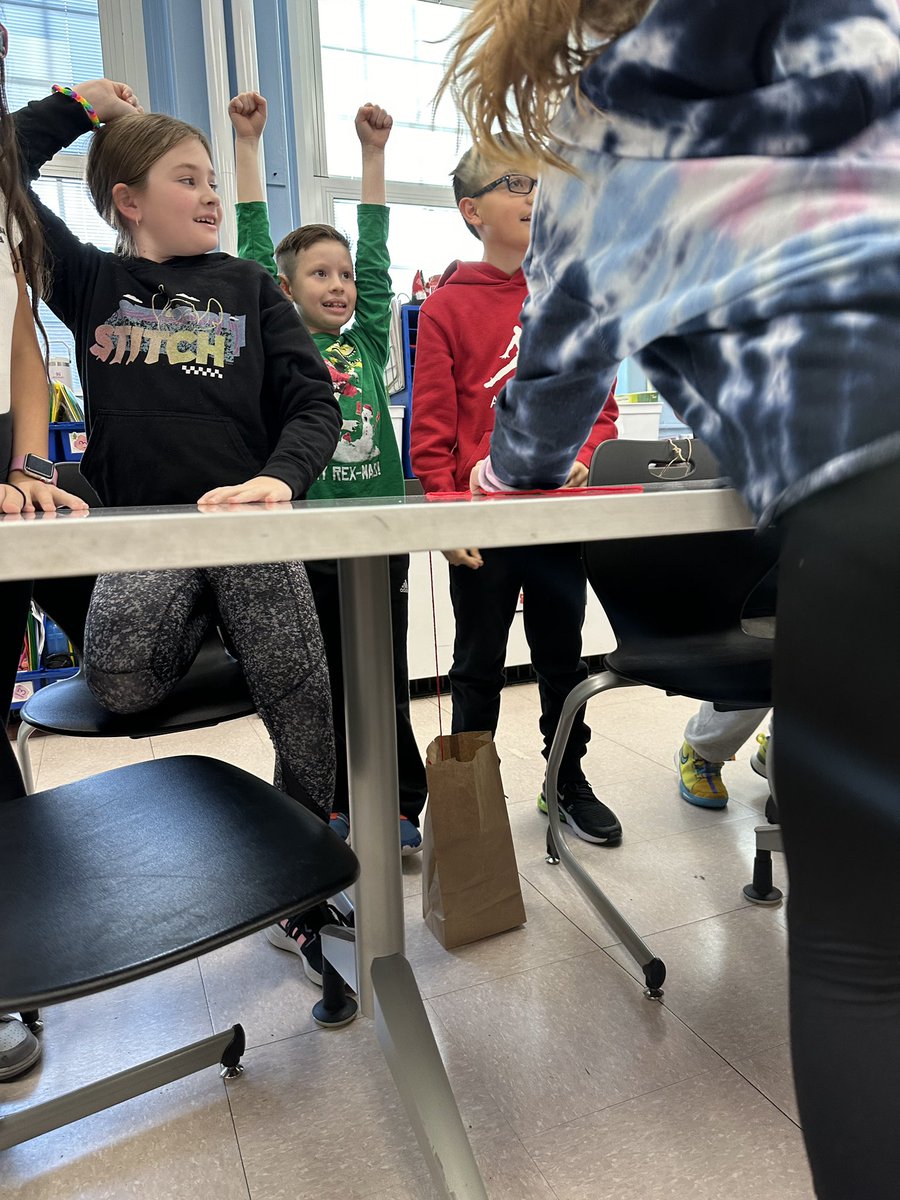 Cane-Cane Olympic Game número #3! Today our festive learners had to communicate to each other where to drop their candy cane with their  👀closed! Look at that groups celebration after winning 🥇 place! <a href="/Ms_Jahelka/">Jacqueline von Bargen</a> <a href="/Jackson_Ave/">Jackson Ave School</a>