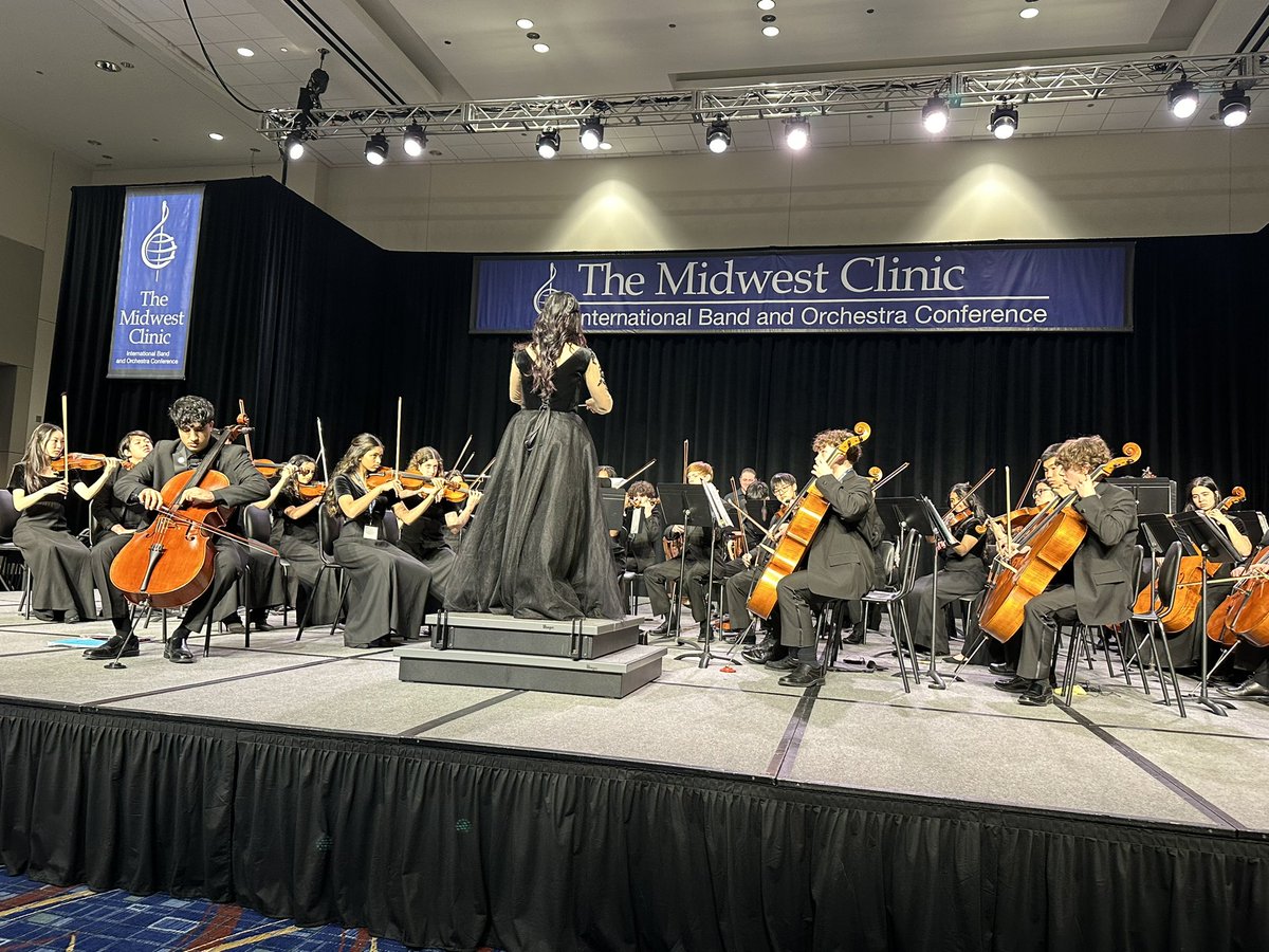 What an honor it was tonight to get to witness the @CainOrchestra perform at the Midwest Clinic in Chicago. This is such a prestigious event that the composers of each piece came to watch! My @KleinCain principal heart is overwhelmed with pride!!! 💜 💜 🎻 #ReignCain