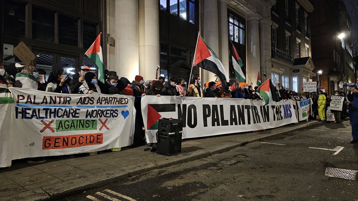 HAPPENING NOW! Health workers and allies are picketing Palantir's HQ in central London, saying No Palantir in the NHS! The surveillance firm has been awarded a £330mil NHS contract whilst actively supporting Israel in its ongoing genocide in Gaza. #PalantirHandsOffOurNHS