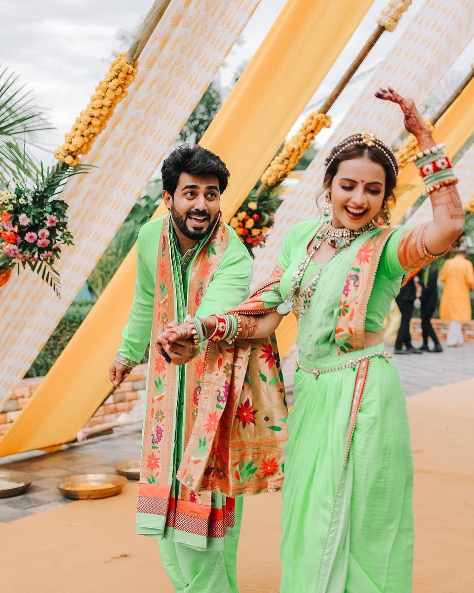 Bride-to-be @shrenuparikh11 enters her haldi ceremony on a scooty wearing a Nauvari saree; twins with groom #AkshayMhatre in green outfits.. 💚

#indianbride #indianwedding #shrenuparikh #hennadesign #mehandidesign #haldiceremony #haldioutfit #haldidecor #haldidress #hennainspire