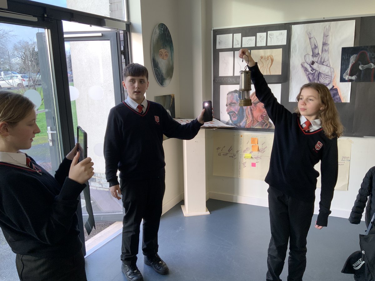 Year 7 @CyresYr7 @StCyresSchool exploring composition of Josef Herman's drawings of the miners of Ystradgynlais, thinking about poses and the spaces the miners would have been working in. Using iPad to take photos to be used as reference images for their drawings. #WelshCulture