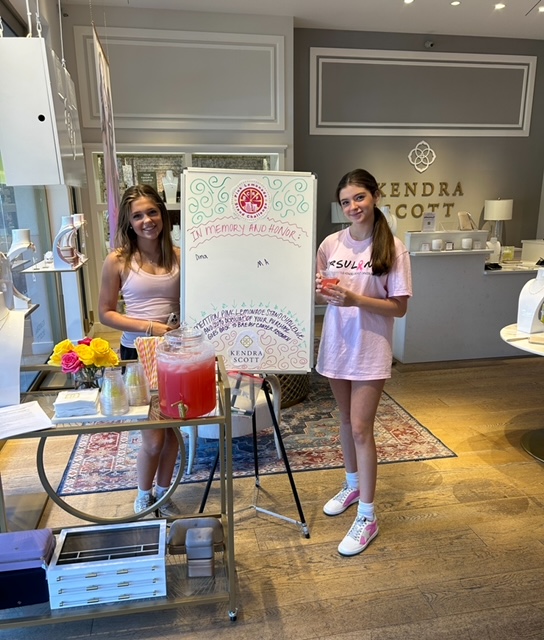 We're incredibly grateful for the support of the younger generation in our mission to raise breast cancer awareness. 💕 These ladies are shining examples, partnering with our @KendraScott team in Dallas to serve pink lemonade in support of the @BCRFcure. 🍋