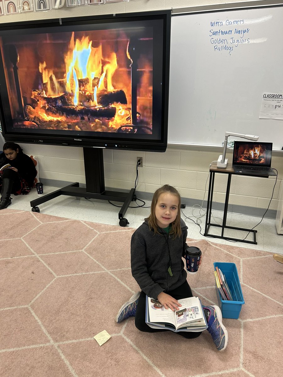 Second graders enjoyed reading by the “fire” and drinking hot cocoa☕️ <a href="/LittleRiverLCPS/">Little River ES</a> #LRES