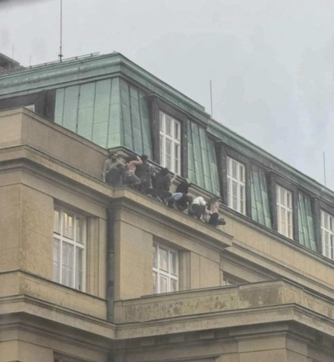 Students hiding during a shooting at Charles University in Prague, Czech Republic, earlier today.