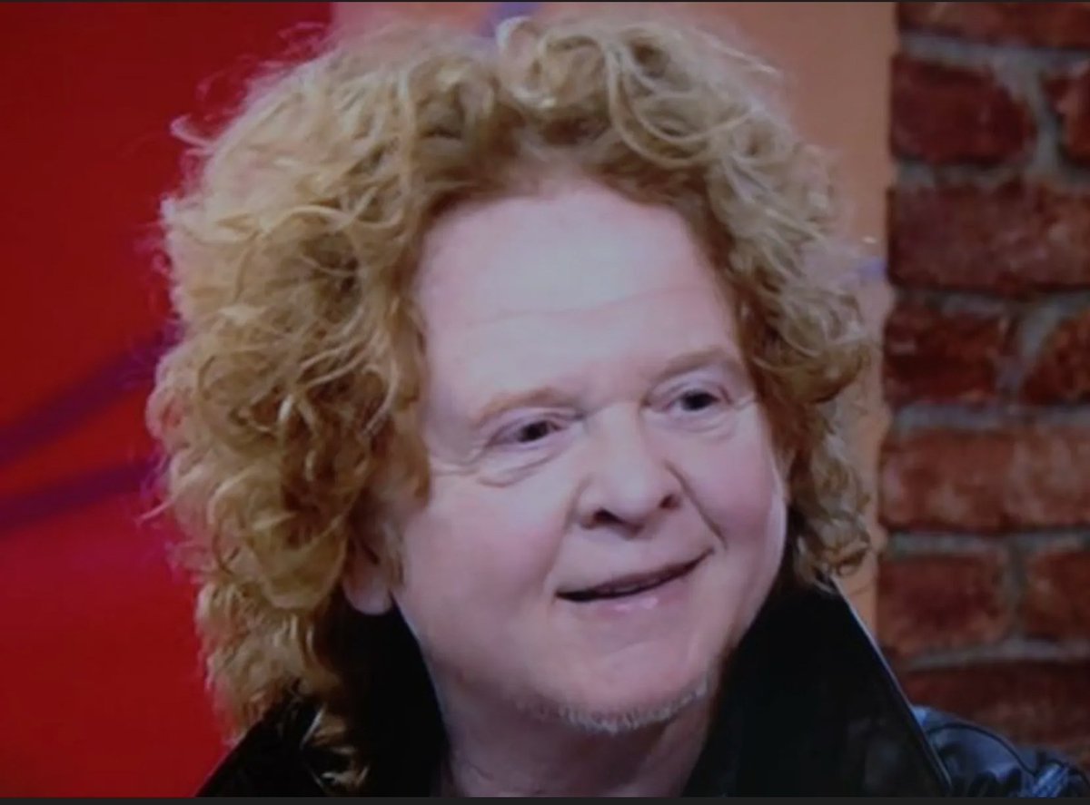 Mick Hucknall or Phil Mitchell with hair?...😀