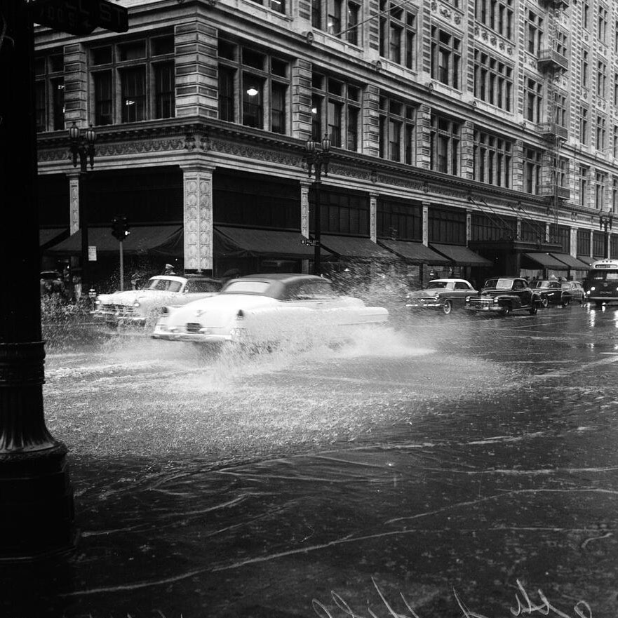Happy First Day of Winter, Los Angeles! It's a wet one out there, so be careful if you're out and about. #WinterSolstice #LARain . . . 📸: 8th and Hill, downtown Los Angeles, during a rainstorm in 1952. Photo from the University of Southern California
