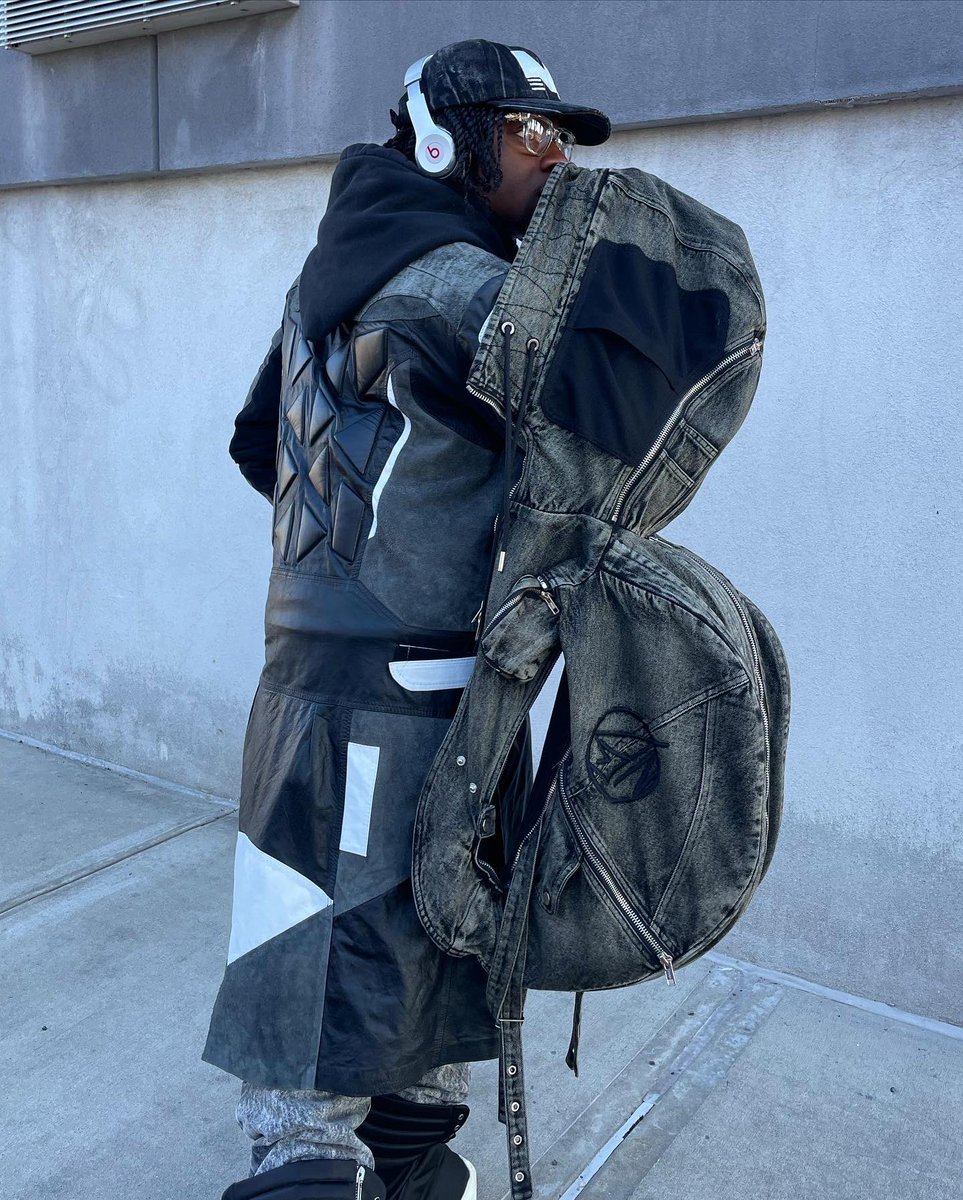 This trench + backpack combination blends together so well