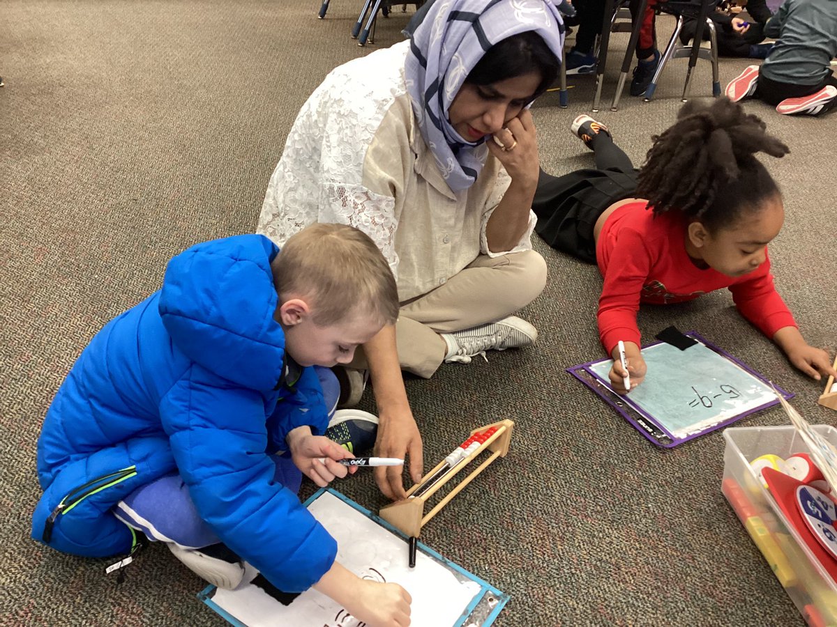 We love having Ms. Asma, one of our parent mentors, helping us during math! We appreciate the parent mentor program giving the students and teachers so much support ❤️ <a href="/D69CommSchools/">D69 Community Schools</a> <a href="/msmeganschumi/">msschumi</a>