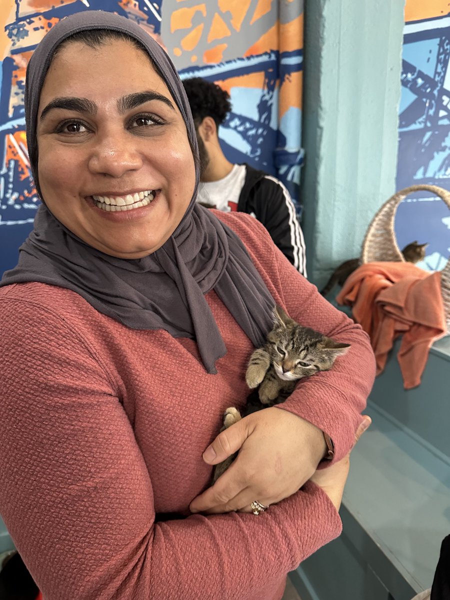 First time cat cafe smiles are Purrfect.